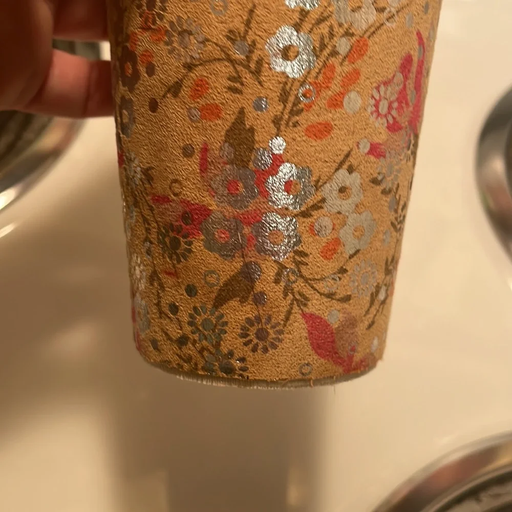 Martini shaker, only used once. Shaker has detailed, beautiful floral design.
